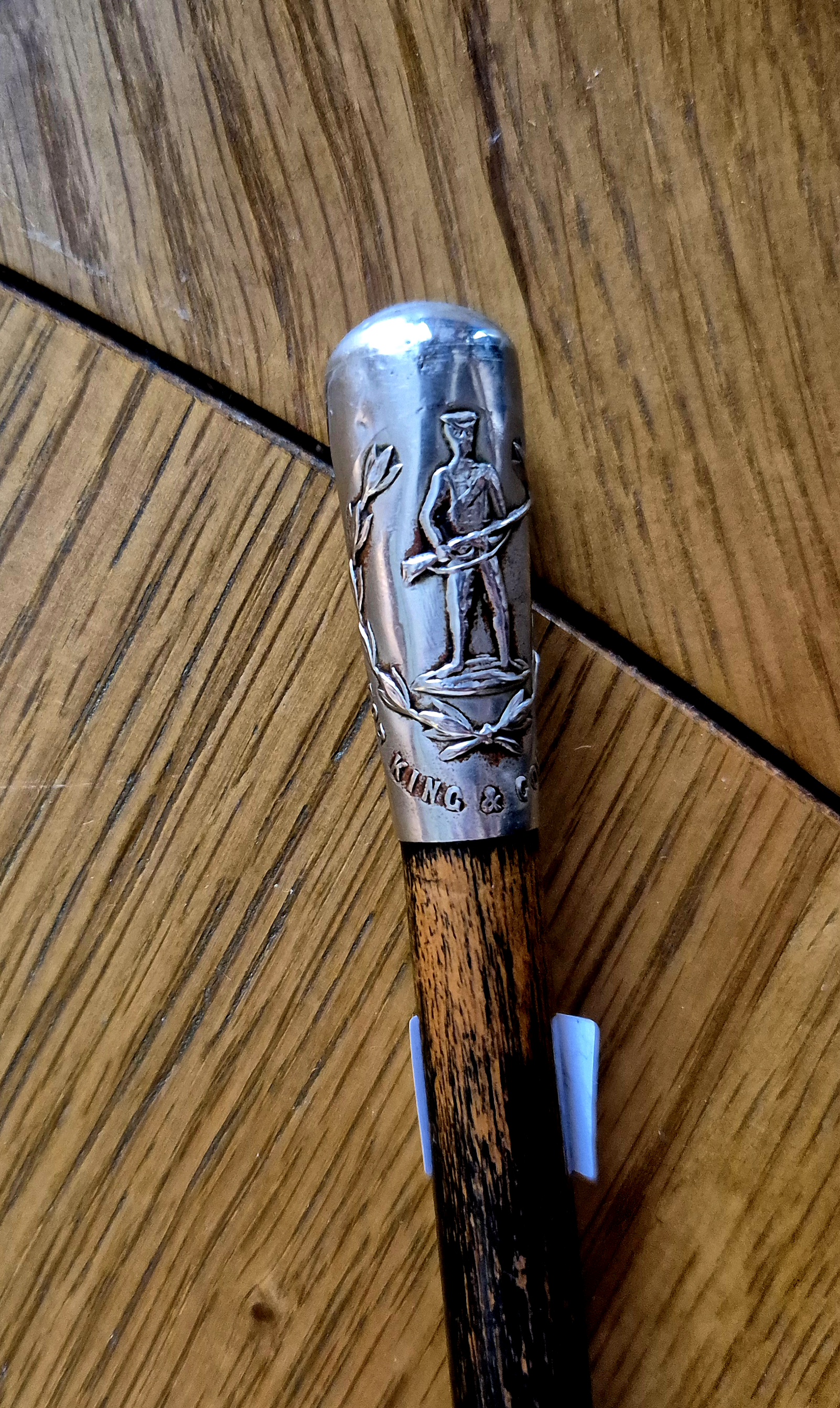 Military swagger stick with white metal topper, 'King and Co