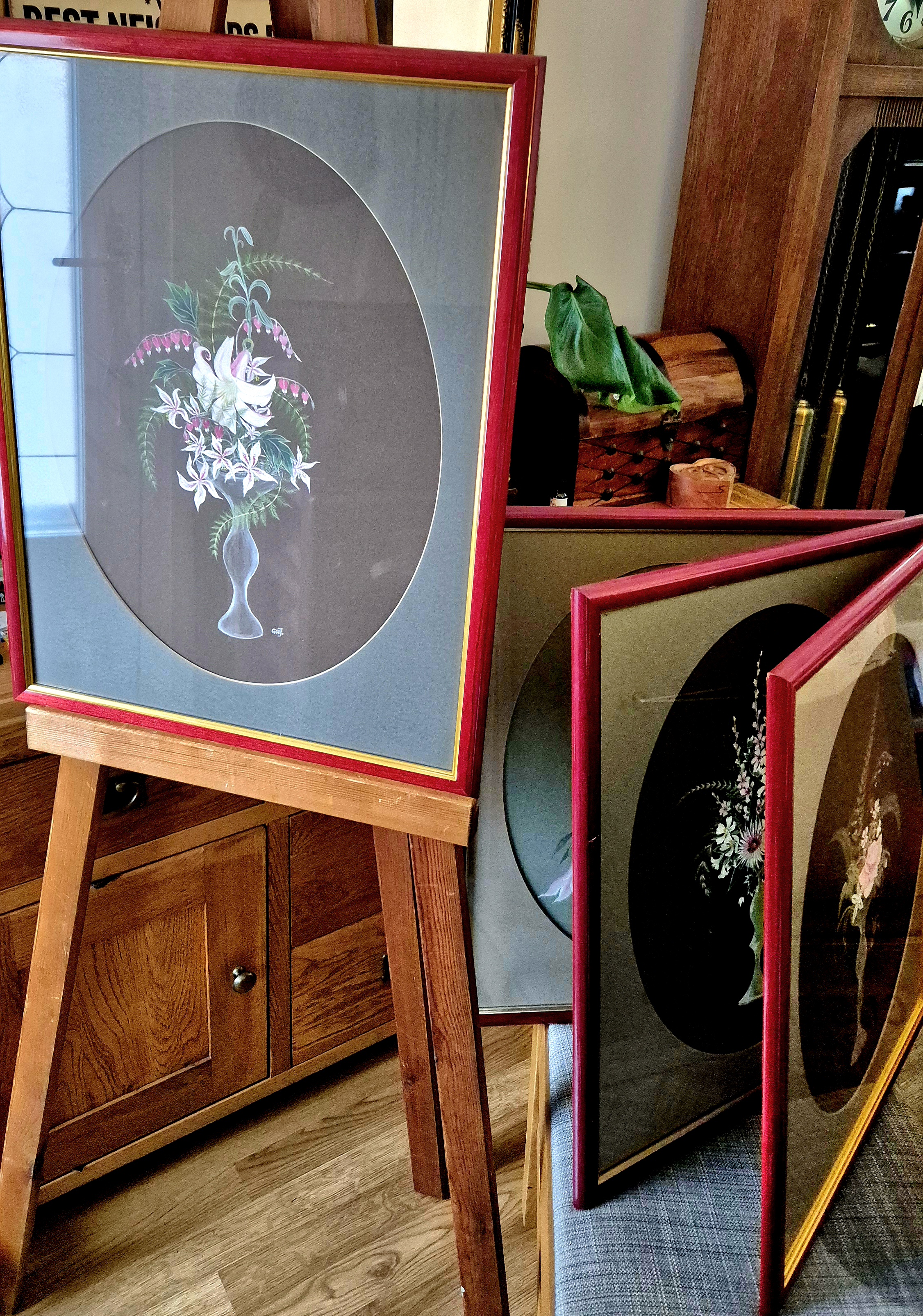 "A matching set of four botanical floral oil paintings, sign